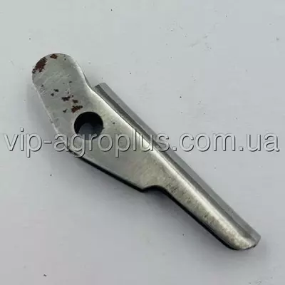 Захист язичка пальця в'язального апарату прес-підбирача Claas